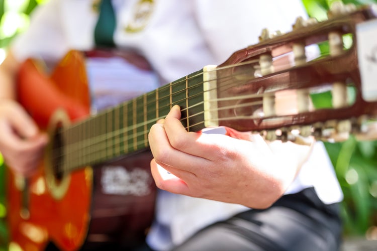 student playing guitar