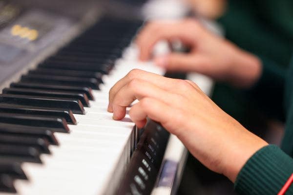 student playing piano